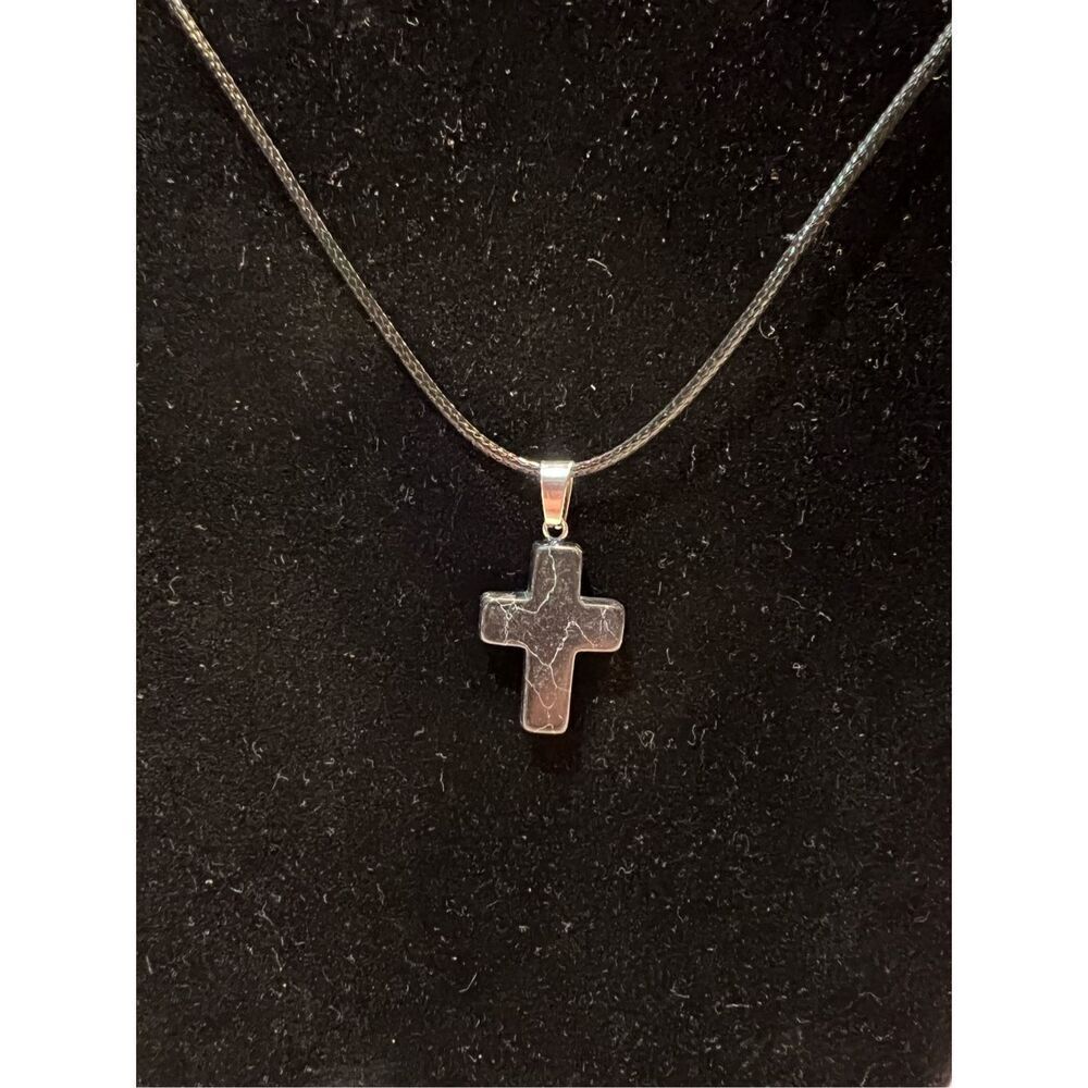 Black Stone Cross on a Black Necklace Cord